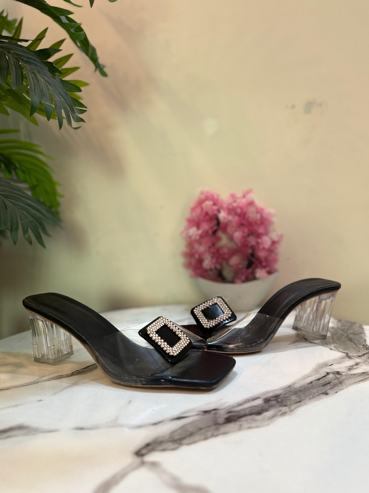 Transparent black heel