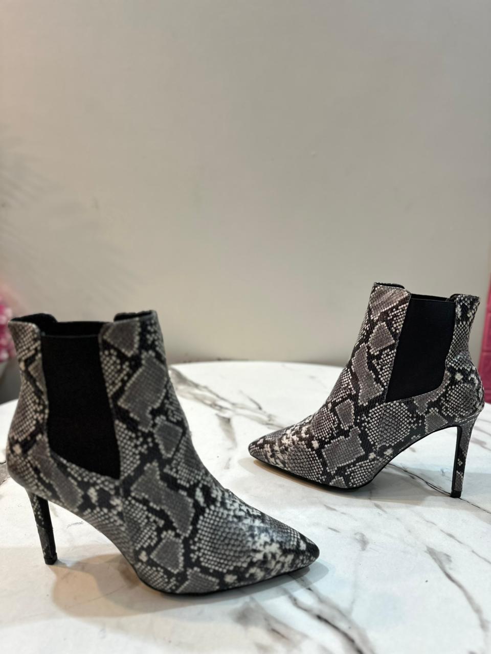 Snake print heeled ankle boot (Billini)