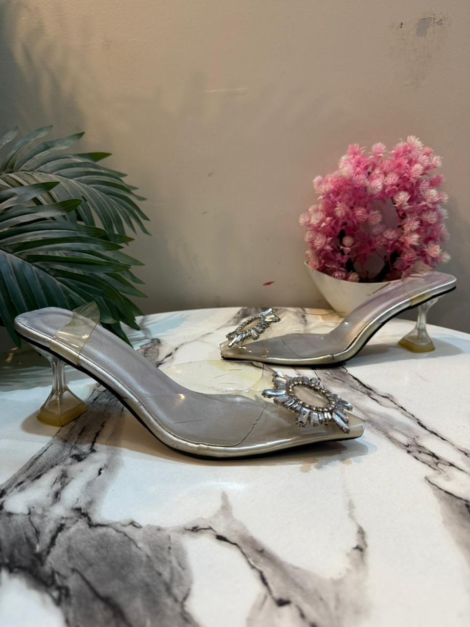 Transparent sling black heel