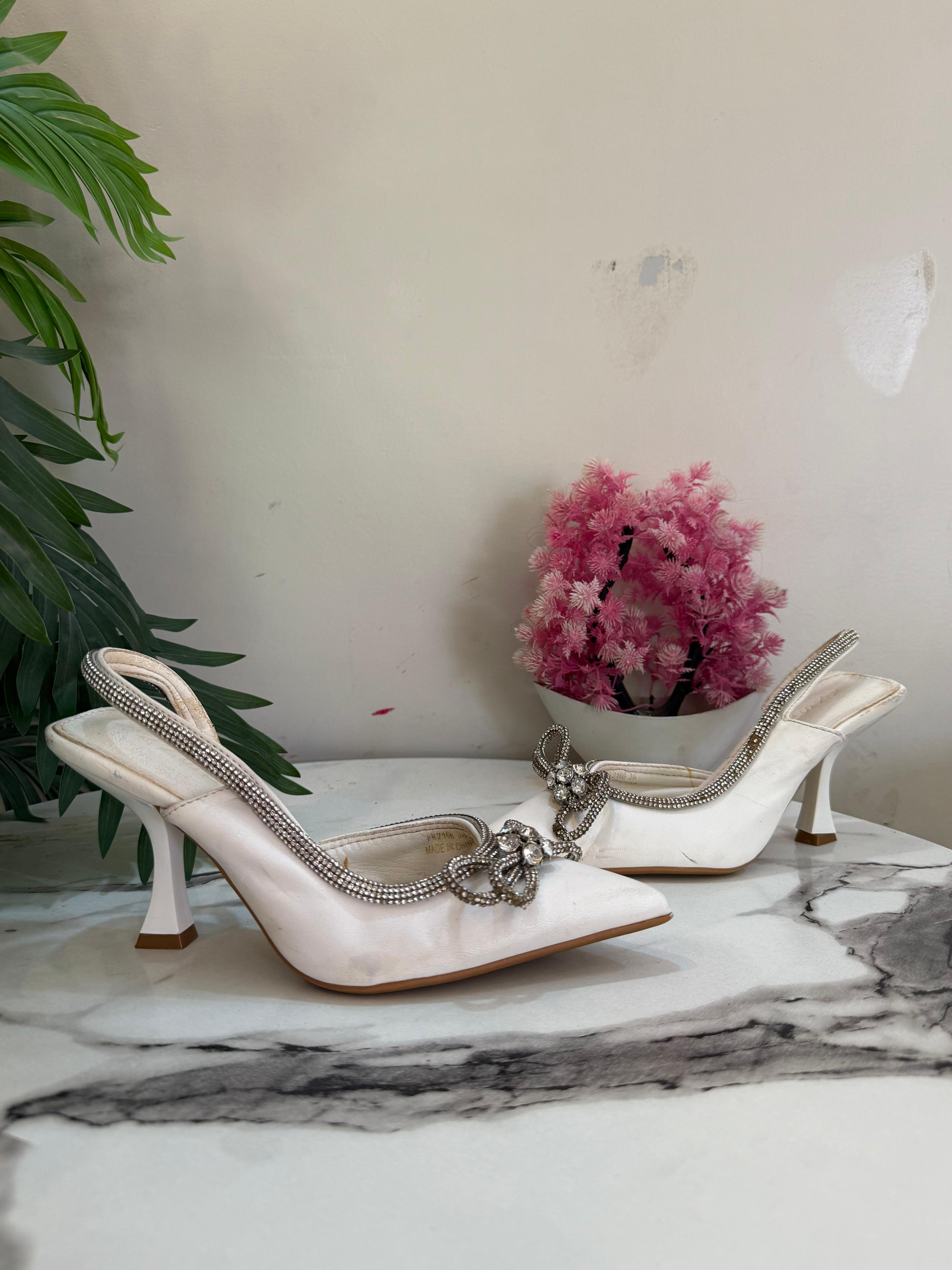 White kitten heel