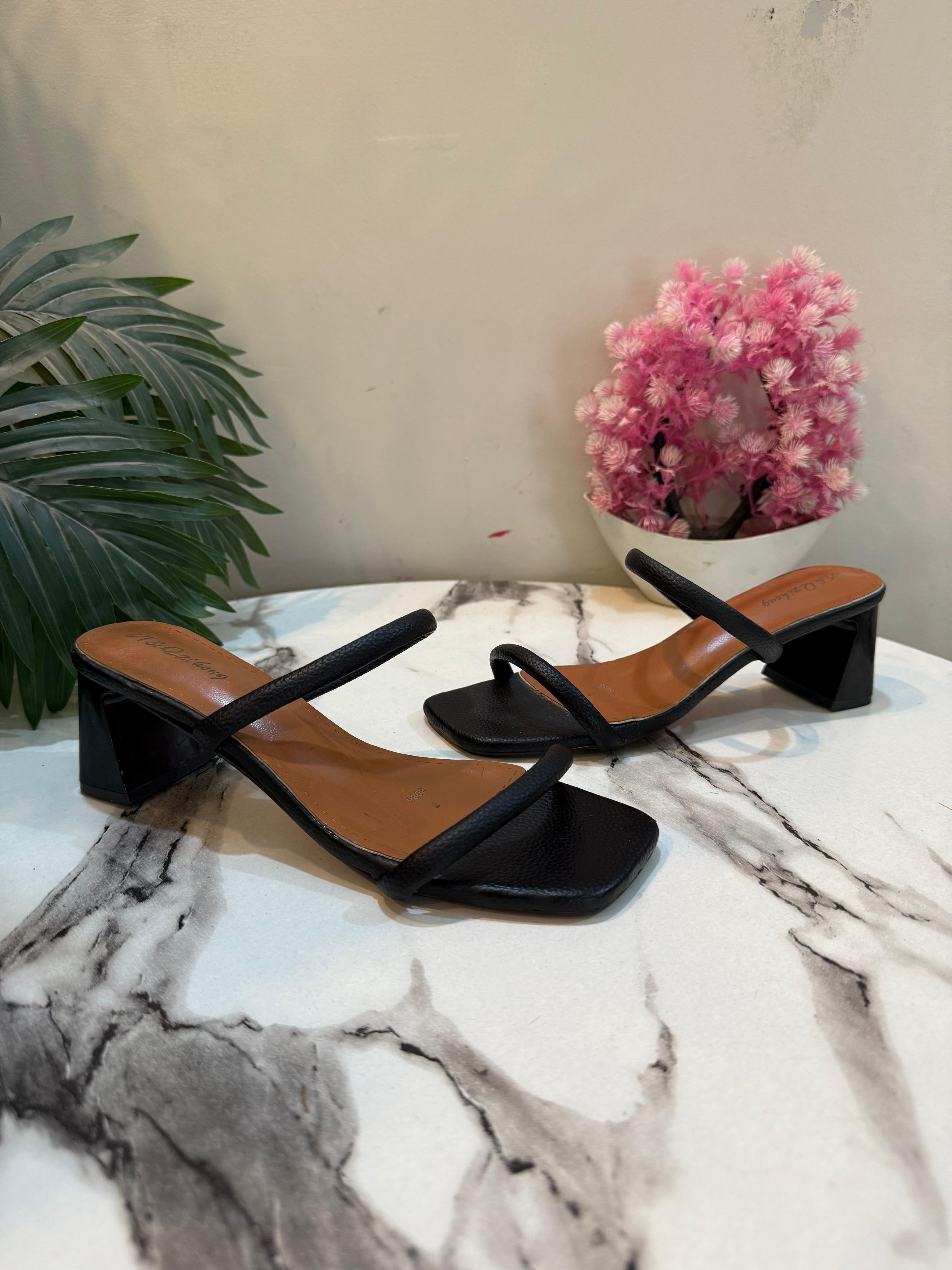 Black kitten heel