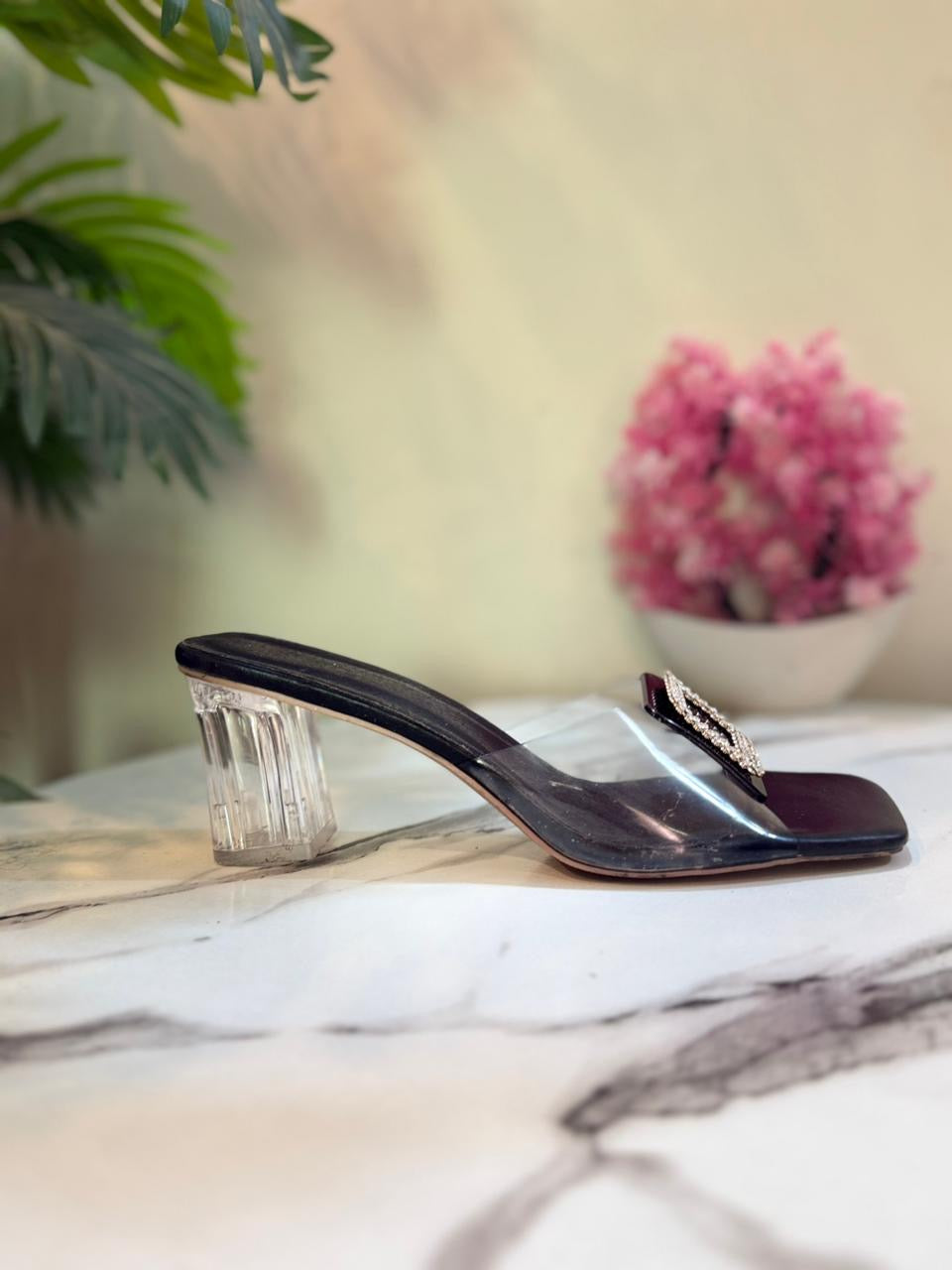 Transparent black heel