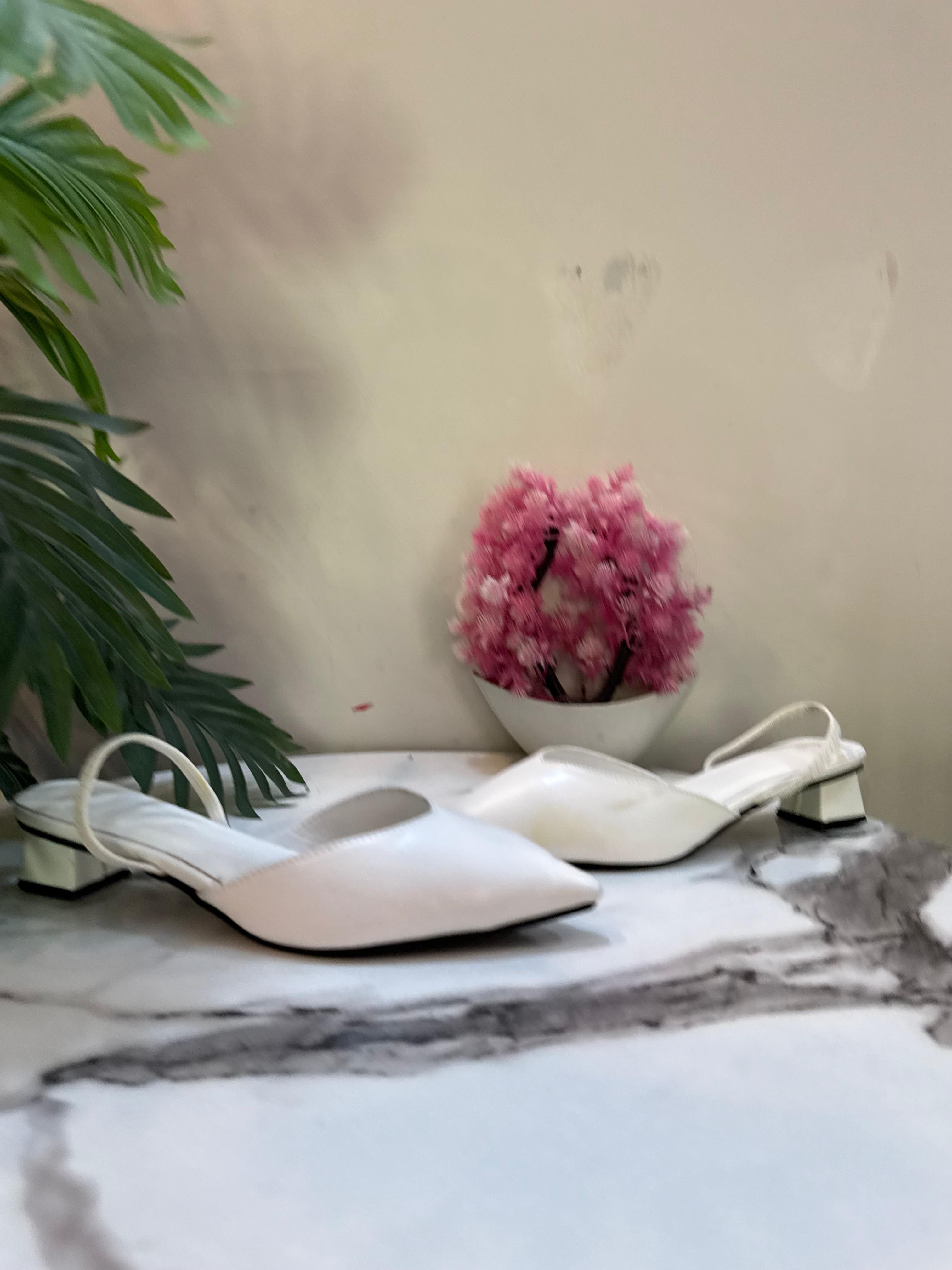 White sling bag heel