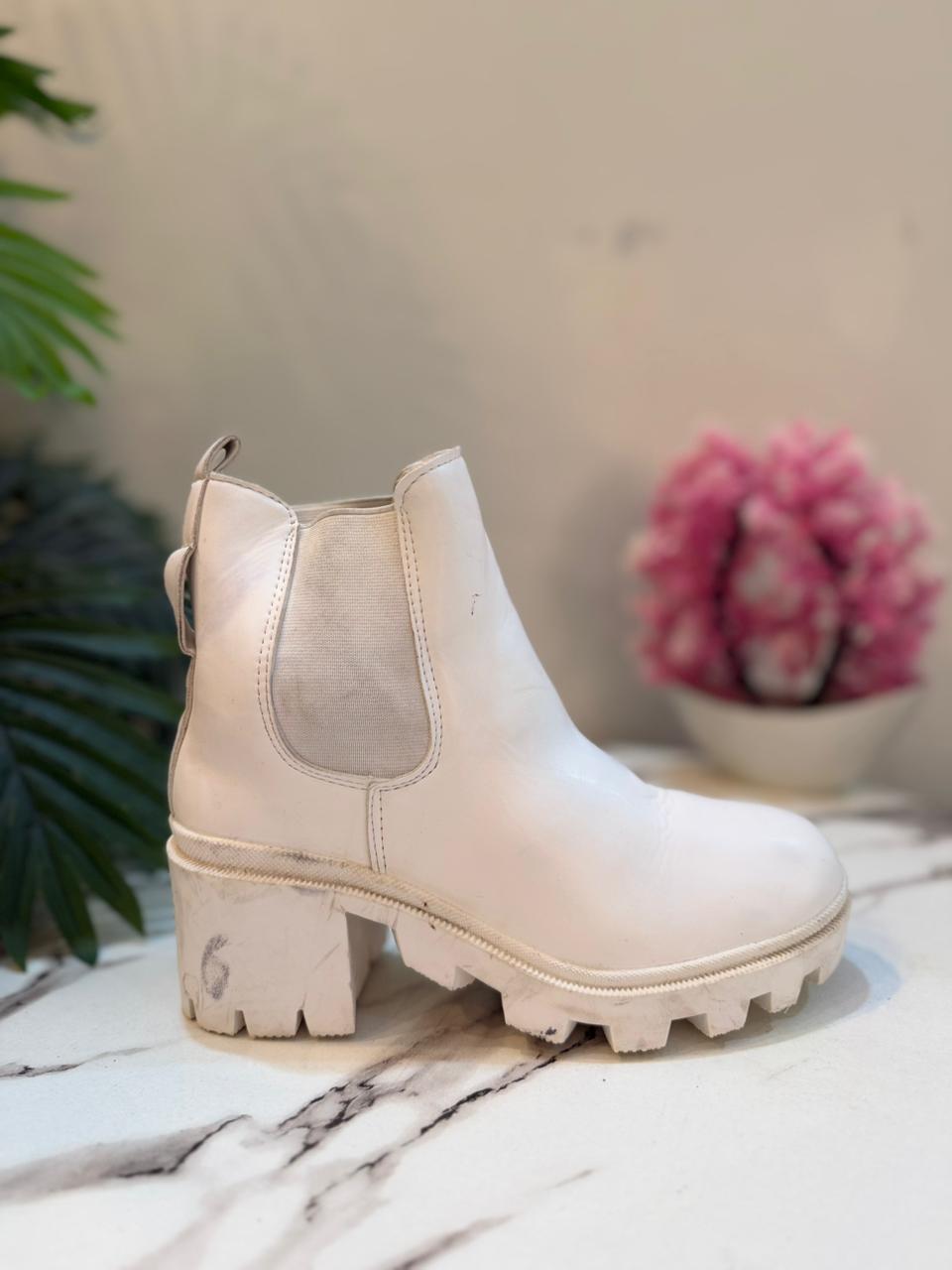 White leather ankle boot