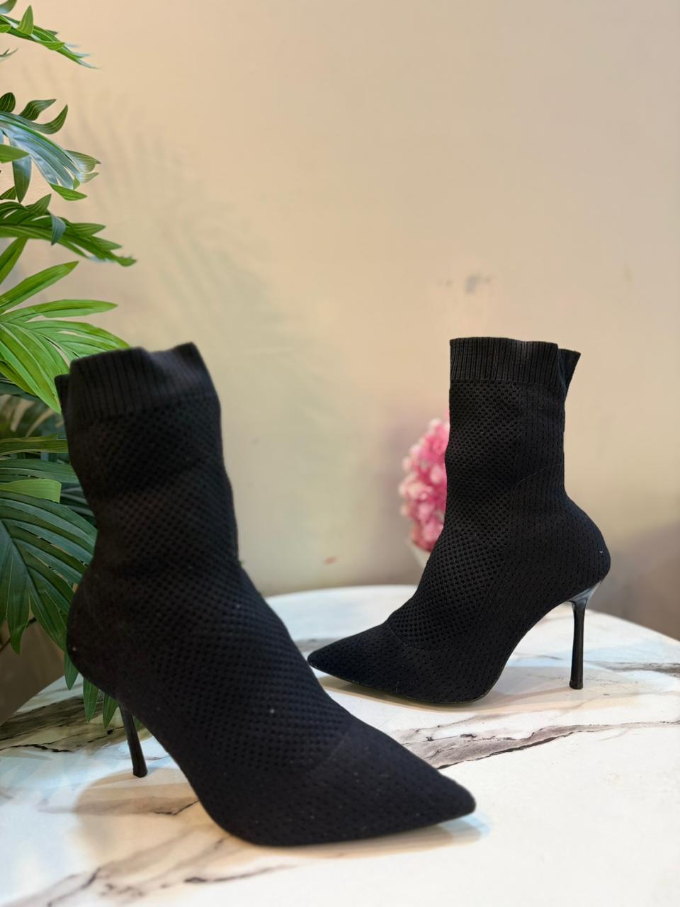 Black sock ankle heeled boot (Zara)