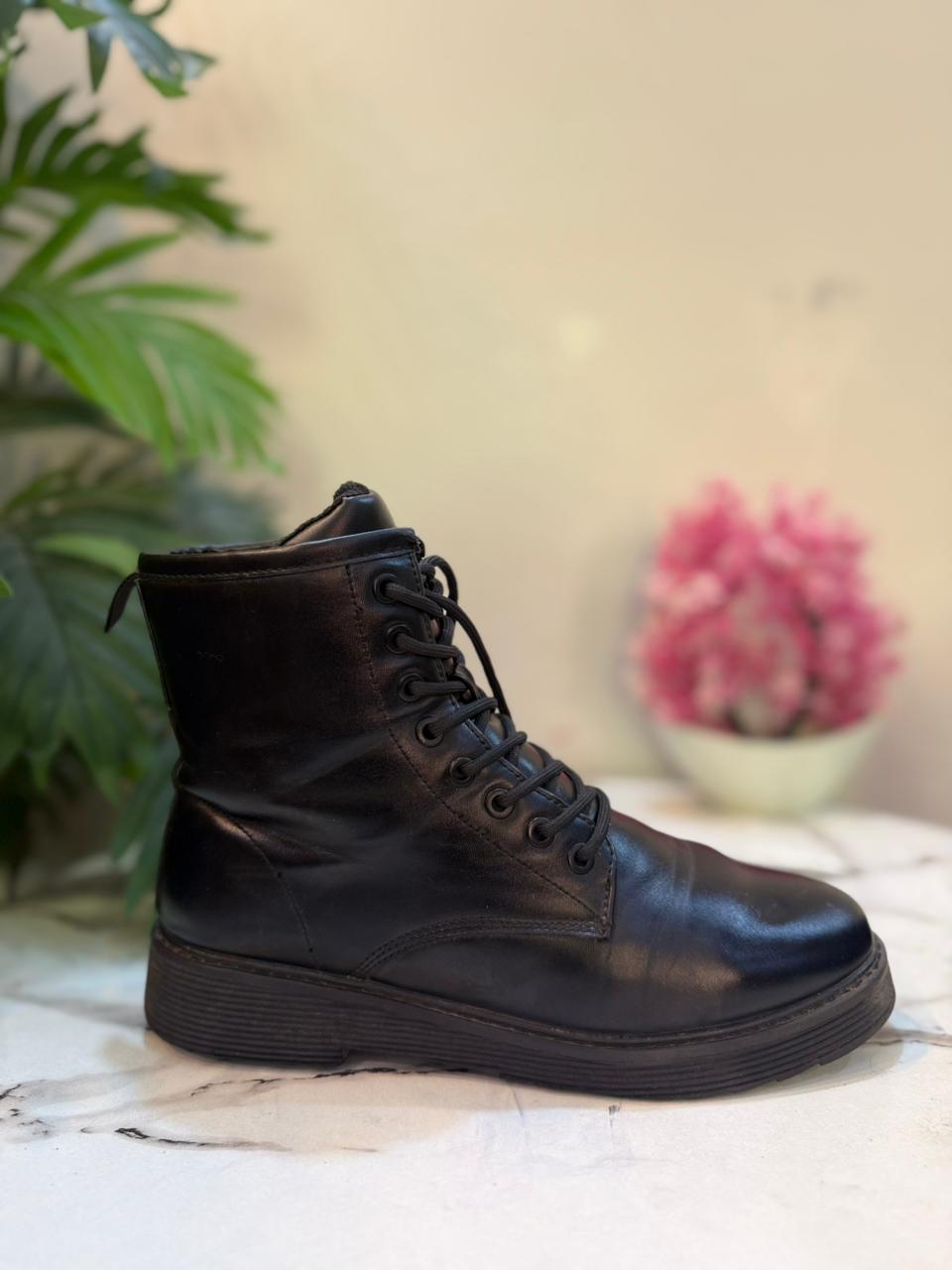 Black leather laceup ankle boot (European brand)