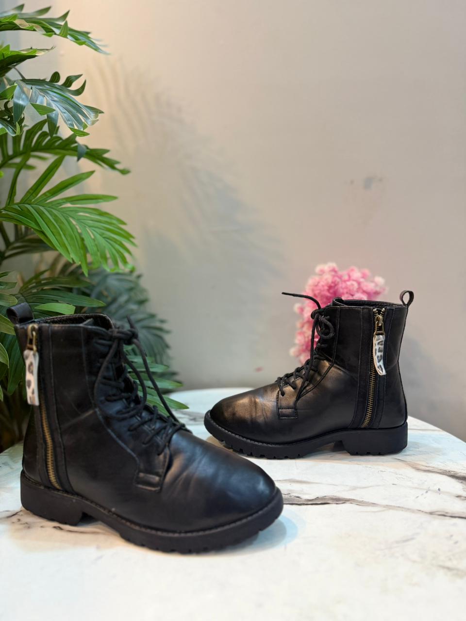 Black leather laceup ankle boot with golden zipper (European brand)