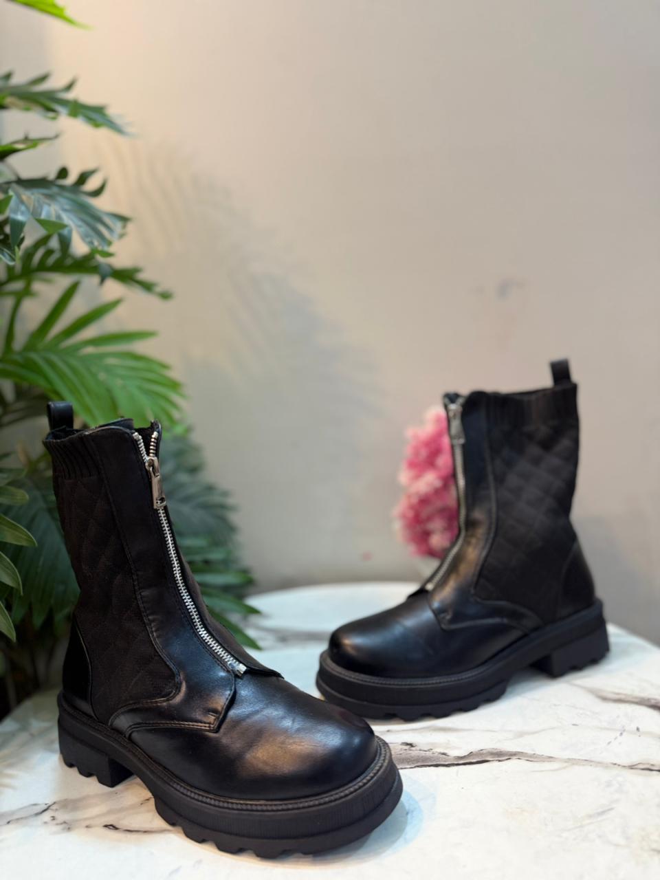 Boack leather ankle boot with front zipper (European brand)