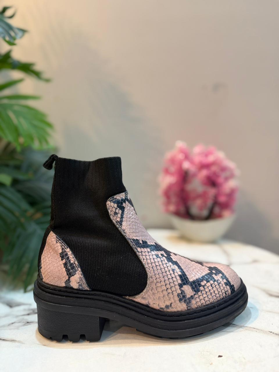 Snake print ankle boot (European brand)