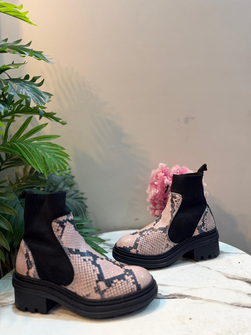 Snake print ankle boot (European brand)