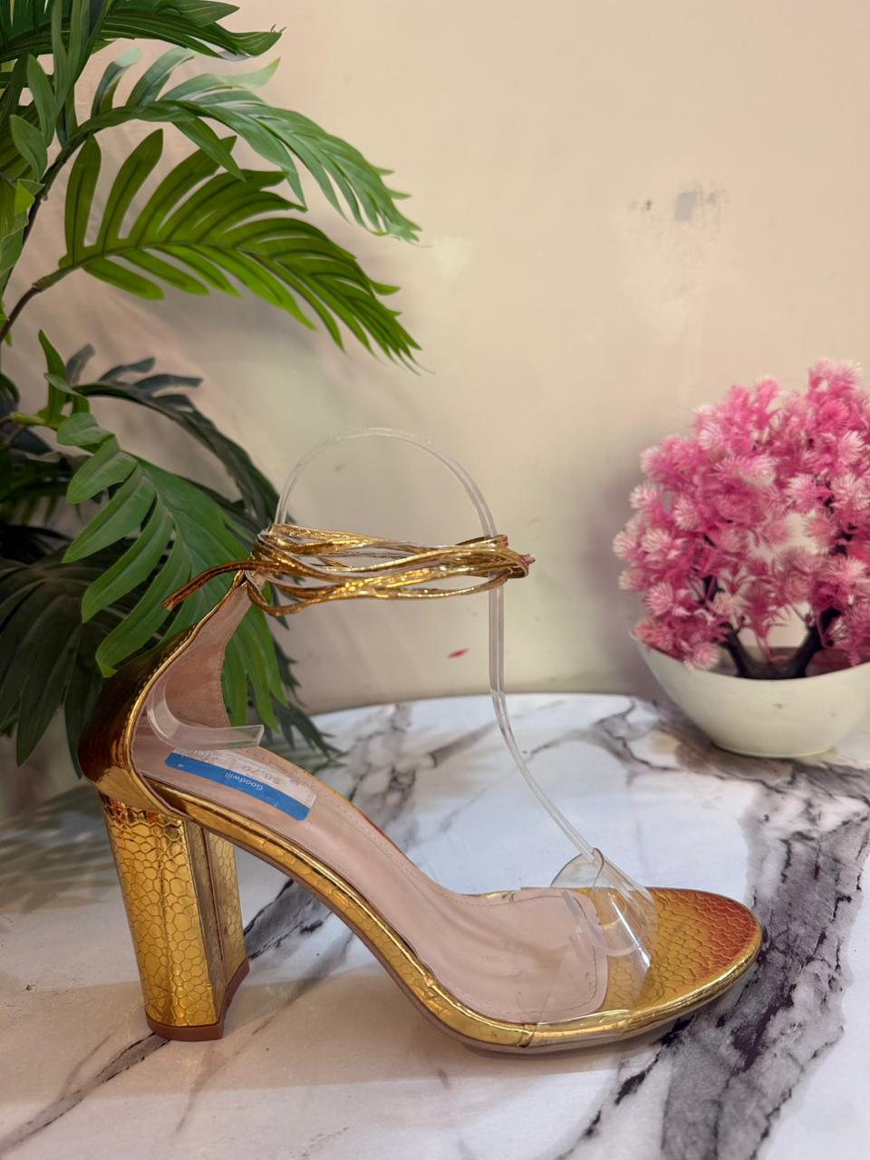 Golden strappy heel