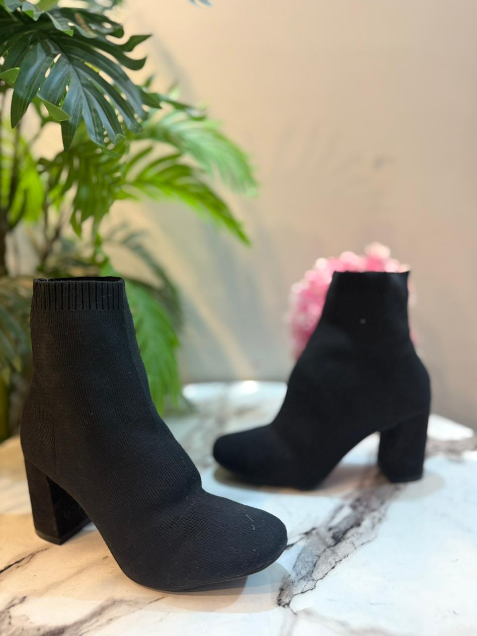 Black sock ankle boot (European brand)