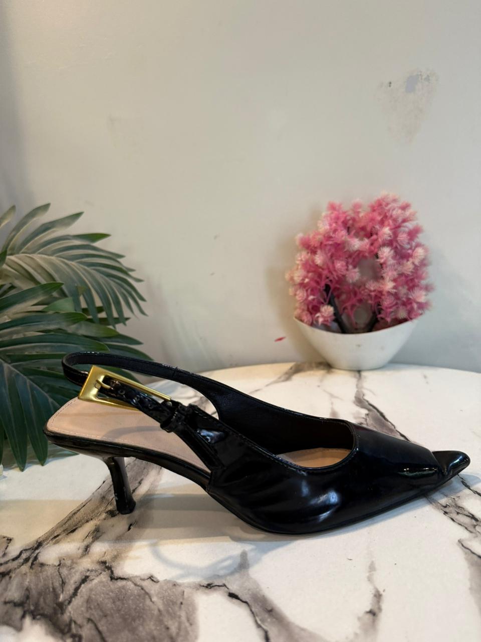 Black sling back heel