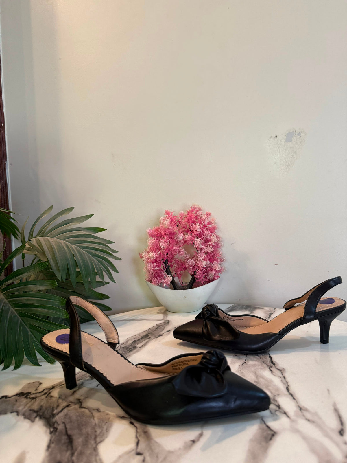Black sling back heel