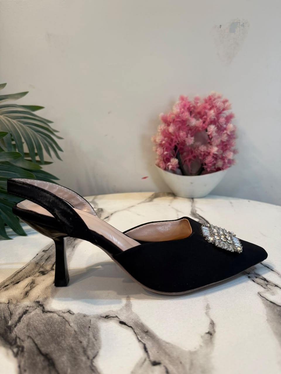 Black sling back heel