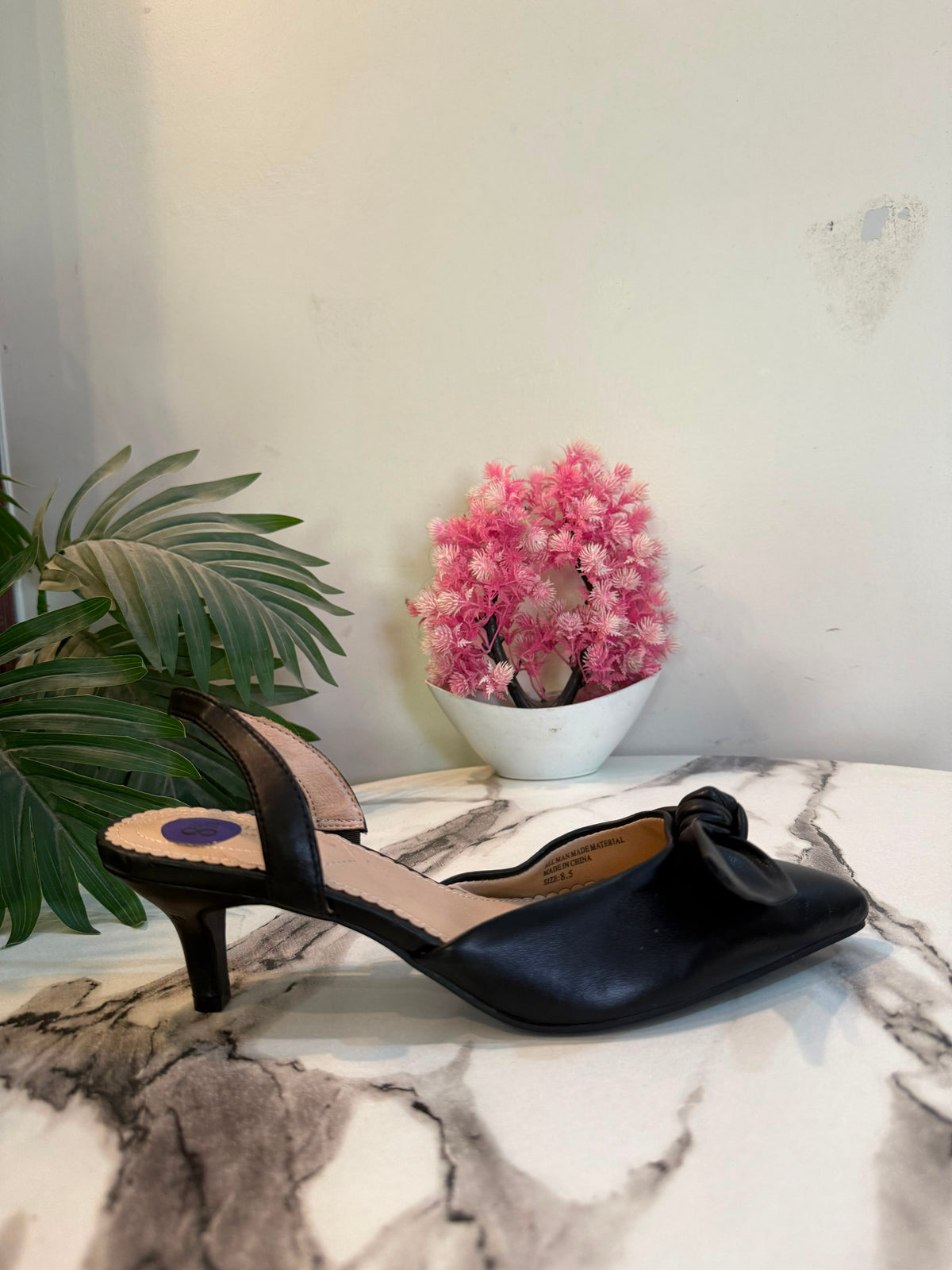 Black sling back heel