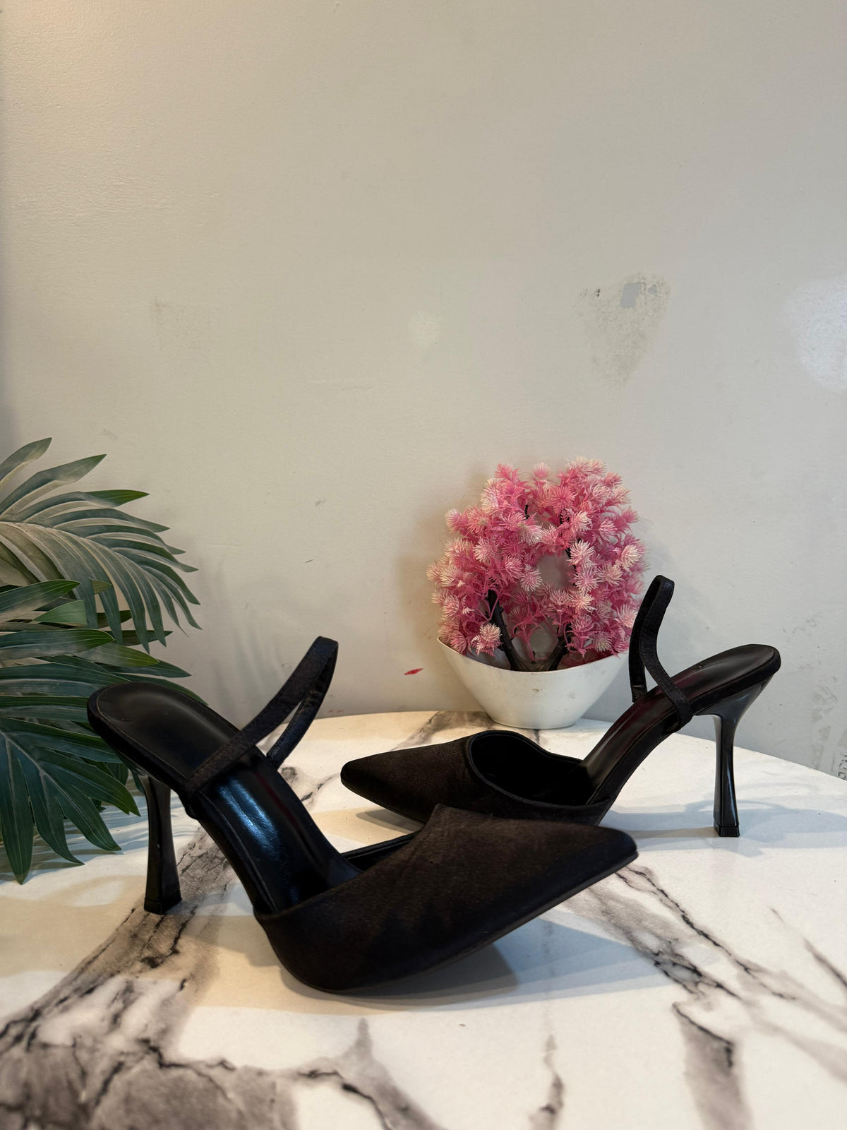 Black sling back heel