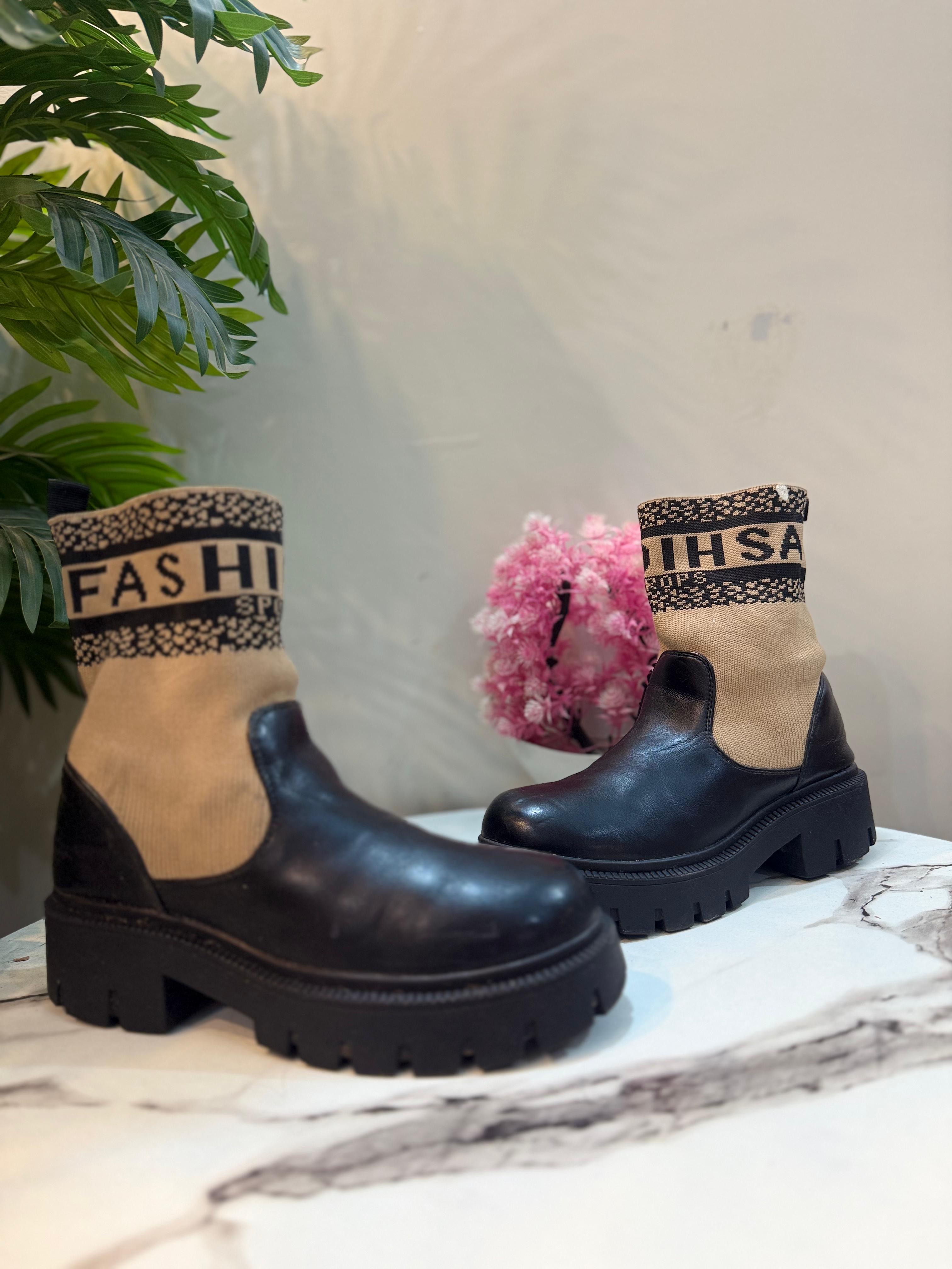 Black leather ankle boot (unknown)