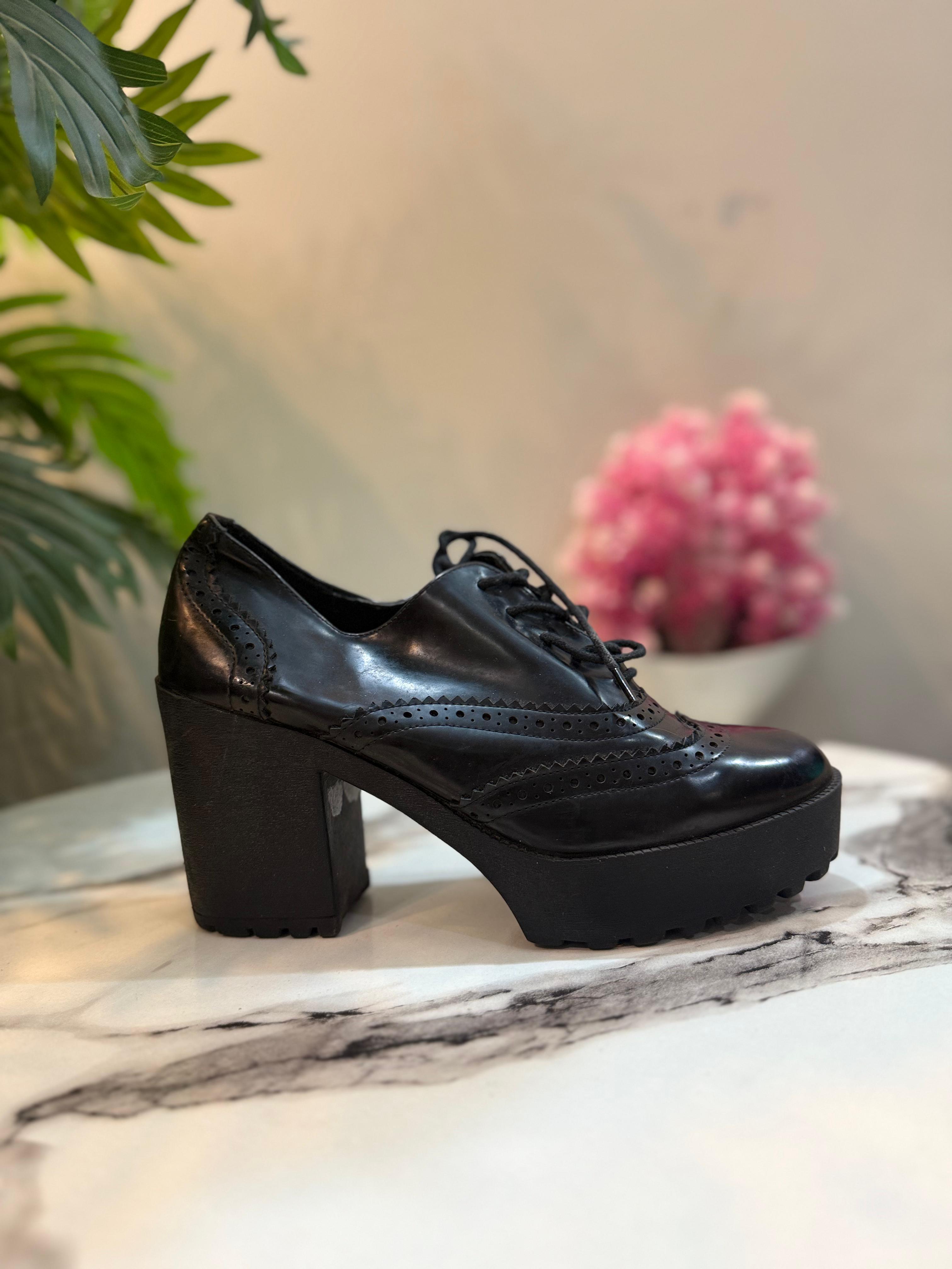 Black leather lace up ankle boot (unknown)