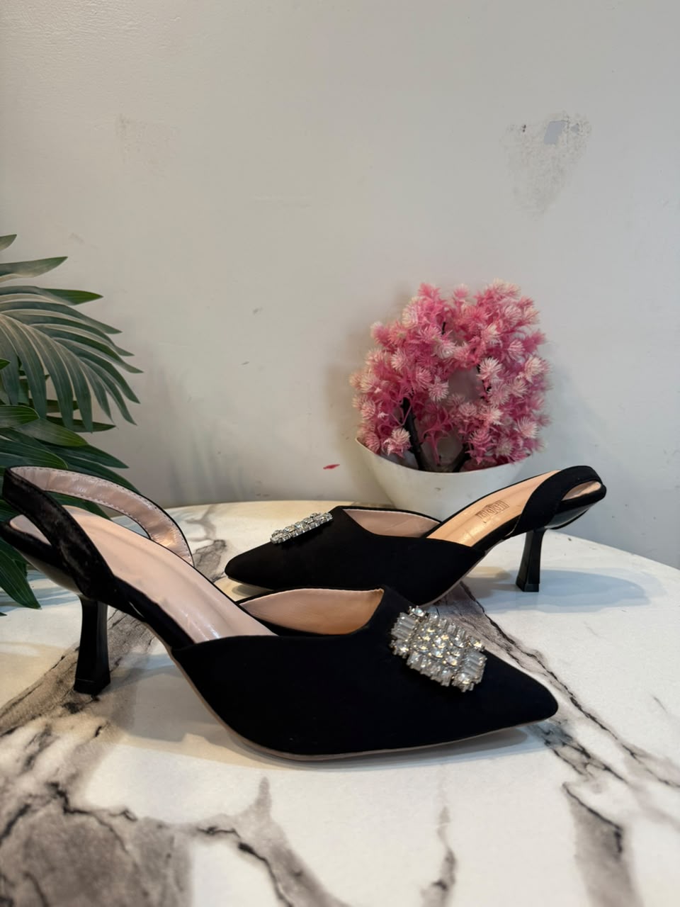 Black sling back heel