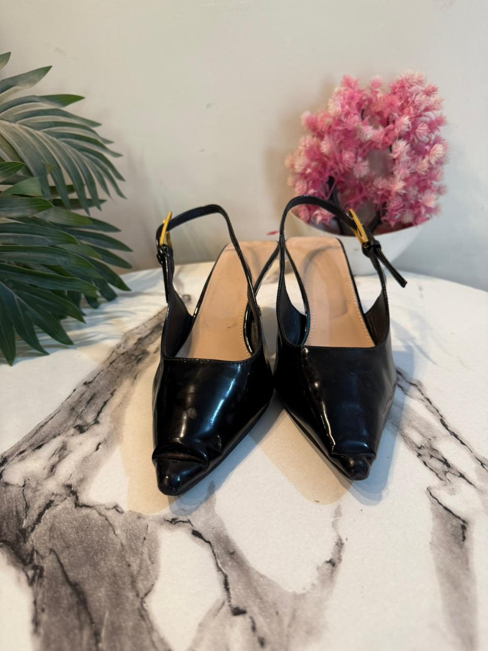 Black sling back heel