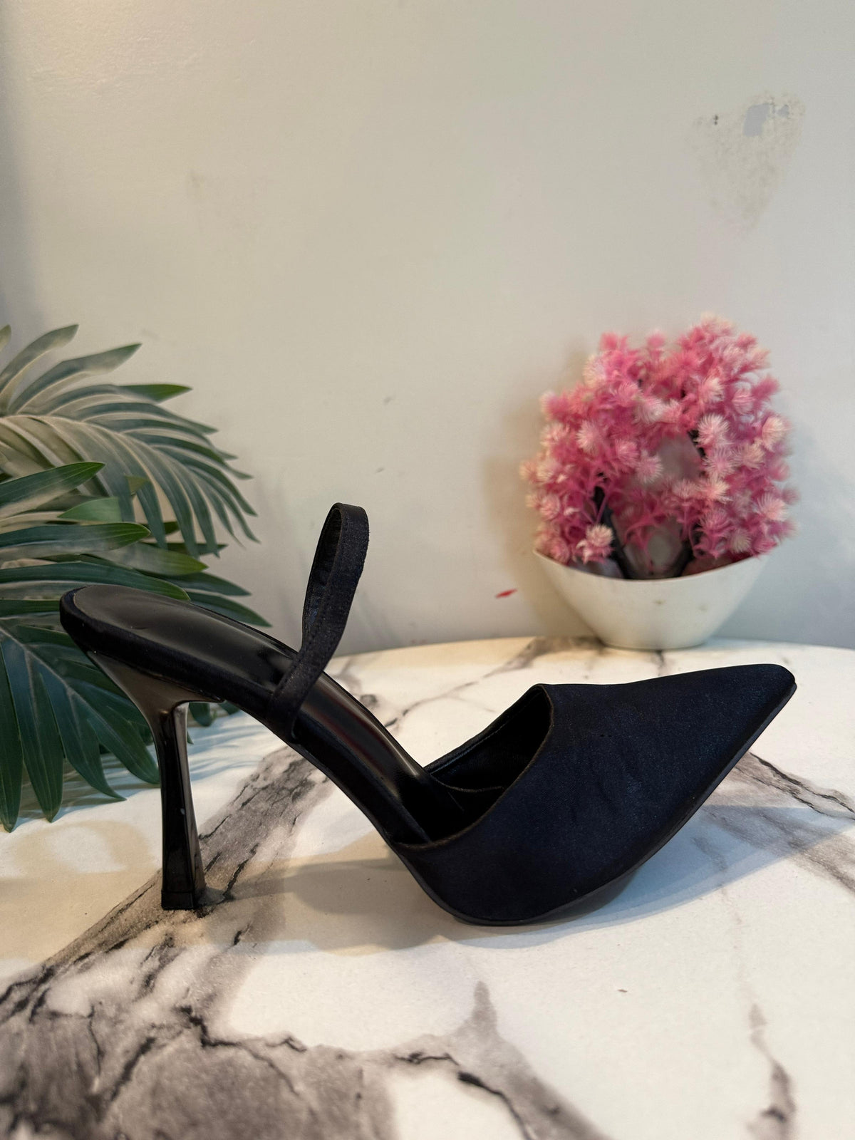 Black sling back heel