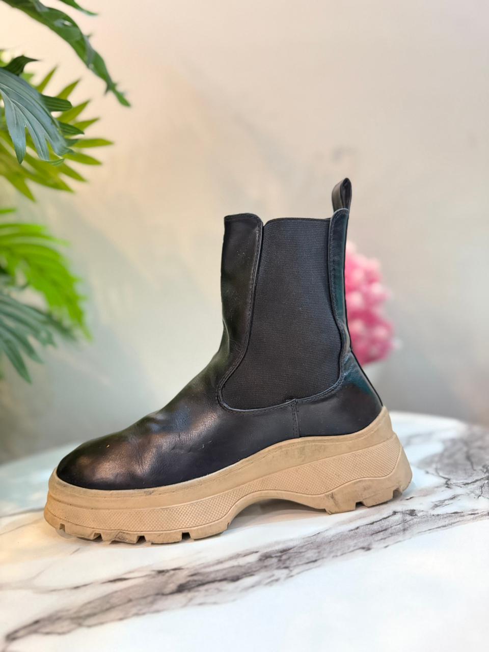 Black leather ankle boot (unknown)