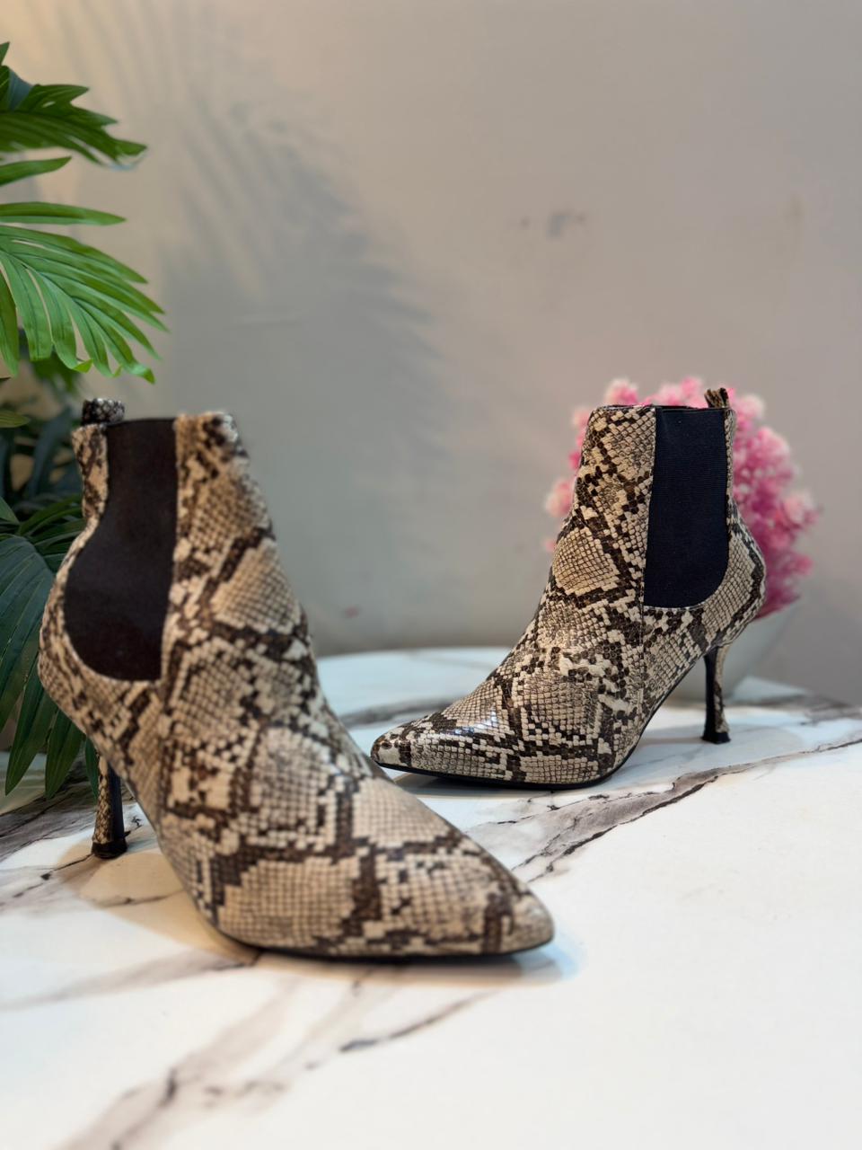 Snake print heeled ankle boot (4th Reckless)