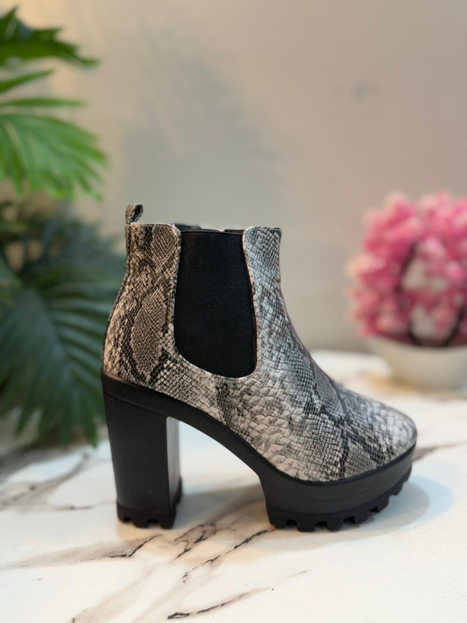 Snake print leather ankle boot