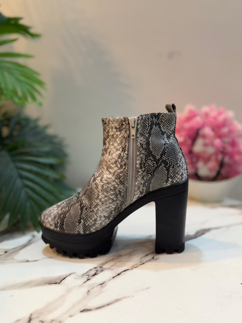 Snake print leather ankle boot