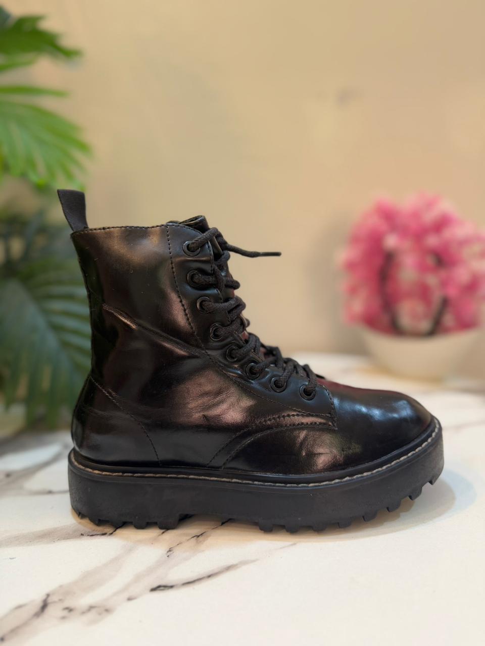 Black patent leather laceup zipper ankle boot