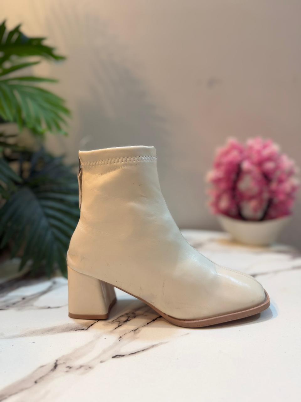 Creamy white leather ankle boot with back zipper