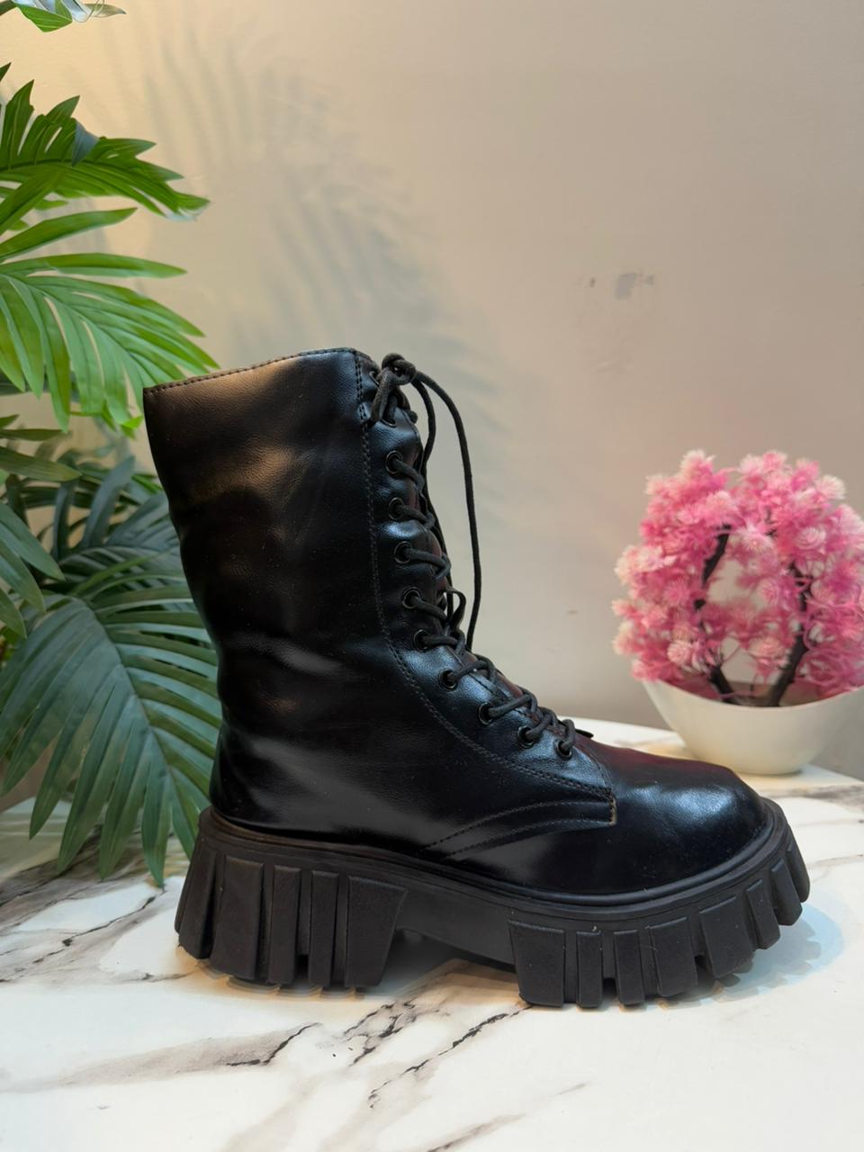 Black leather laceup ankle boot with side zipper (unknown)