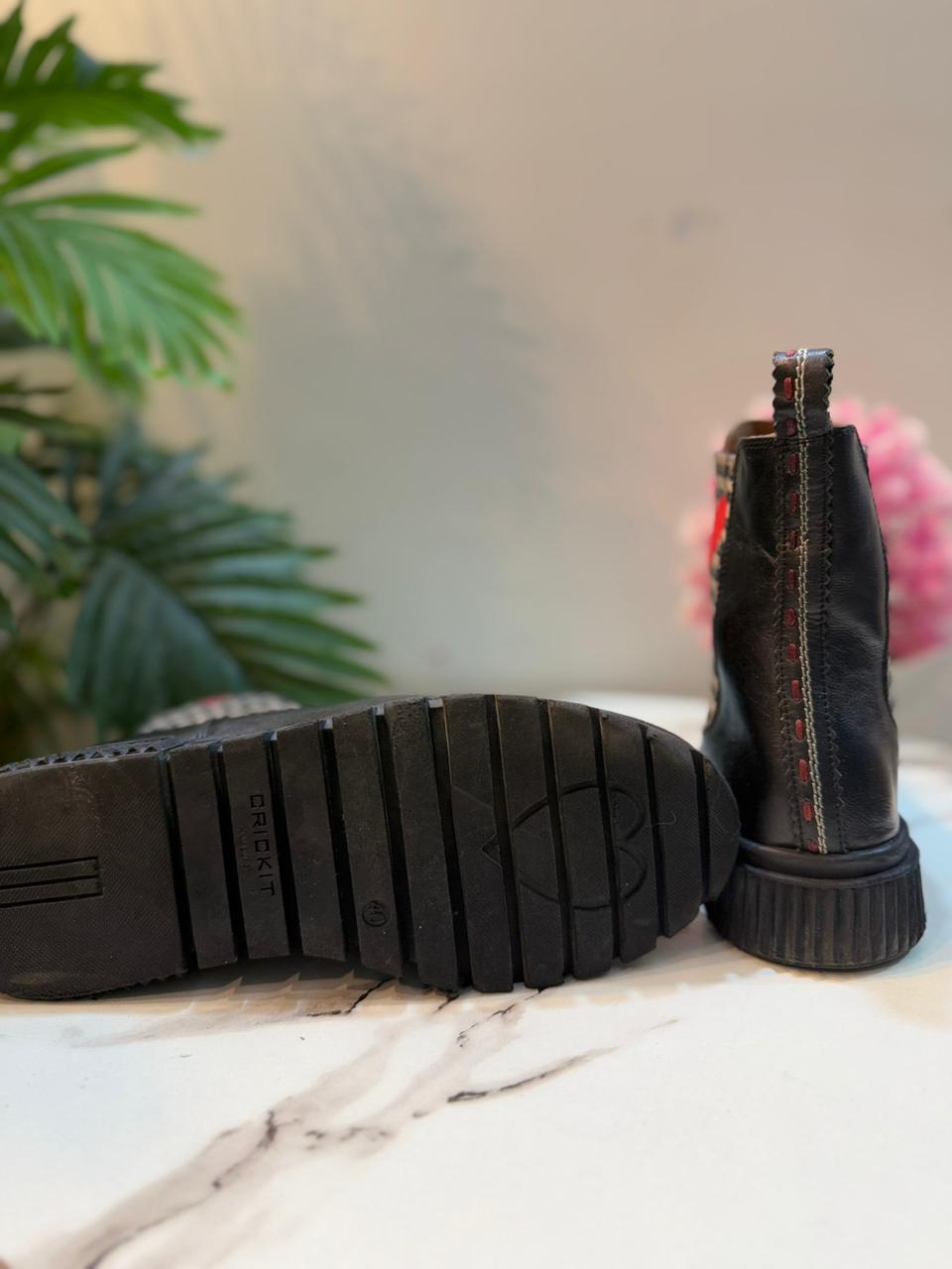 Black leather ankle boot