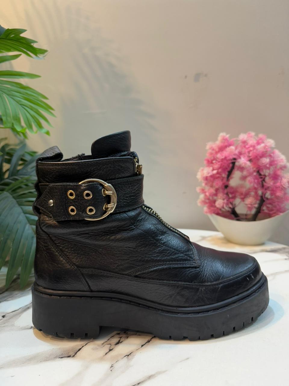 Black leather ankle boot with golden zipper (European Brand)