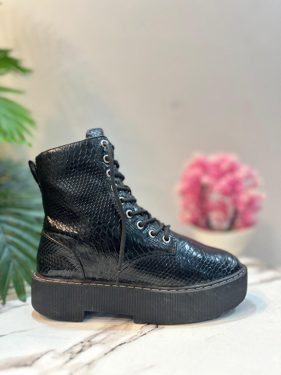 Black leather laceup ankle boot (H&M)