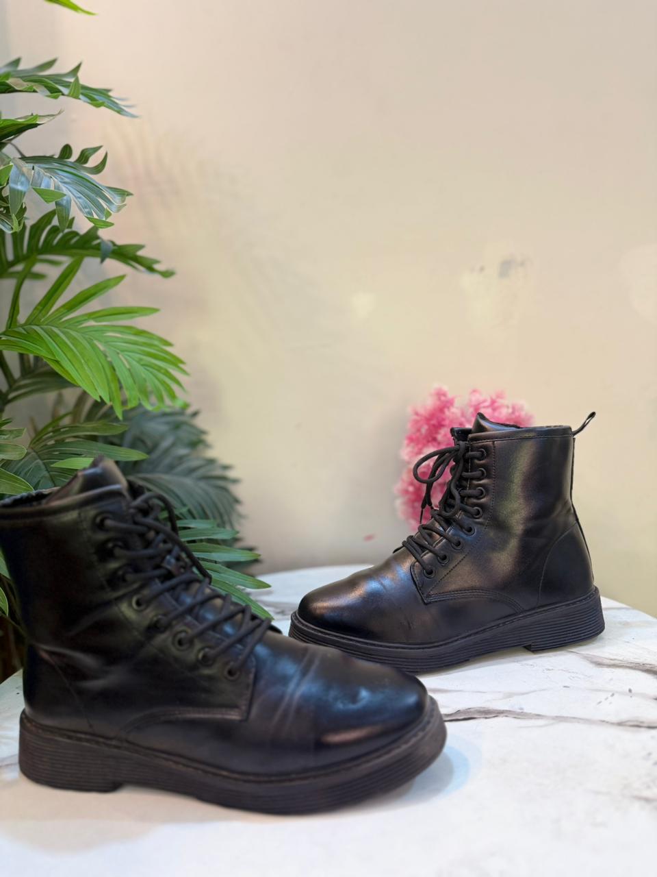 Black leather laceup ankle boot (European brand)