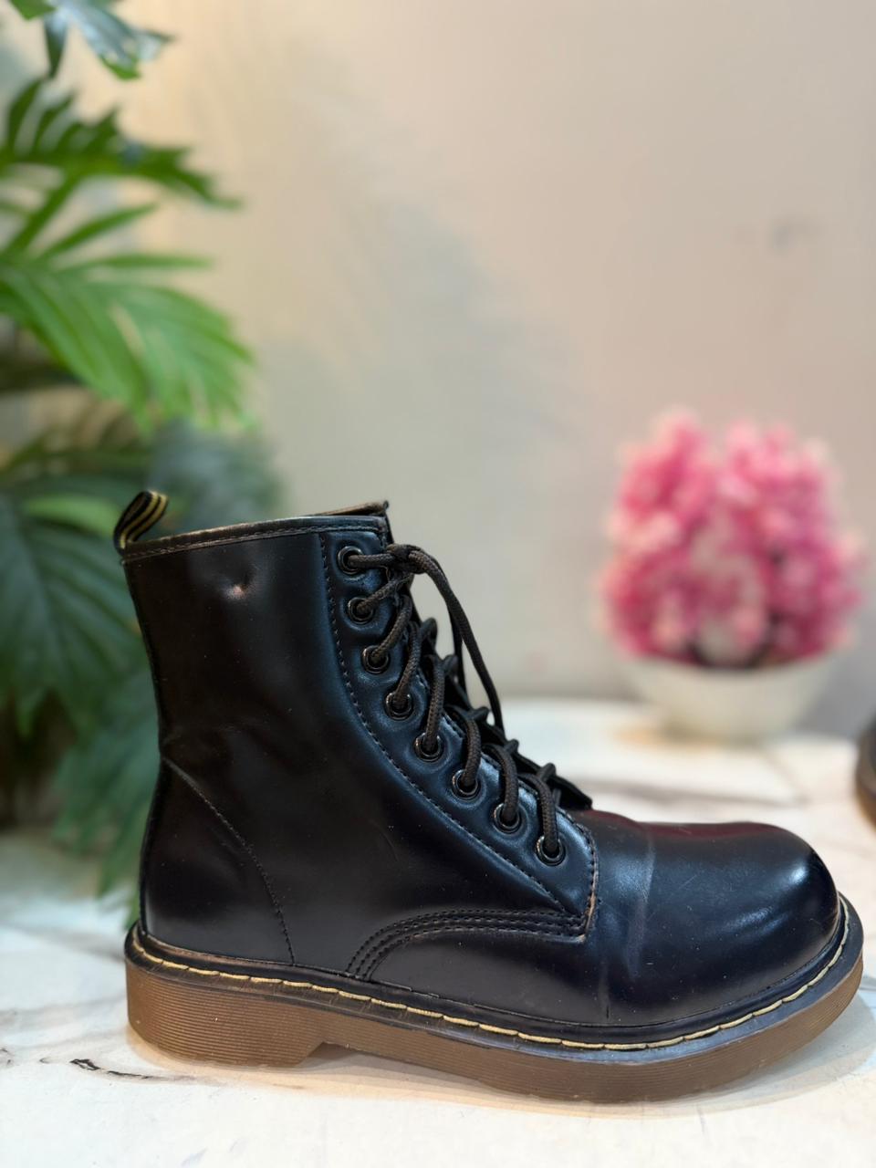 Black leather laceup ankle boot (European brand)