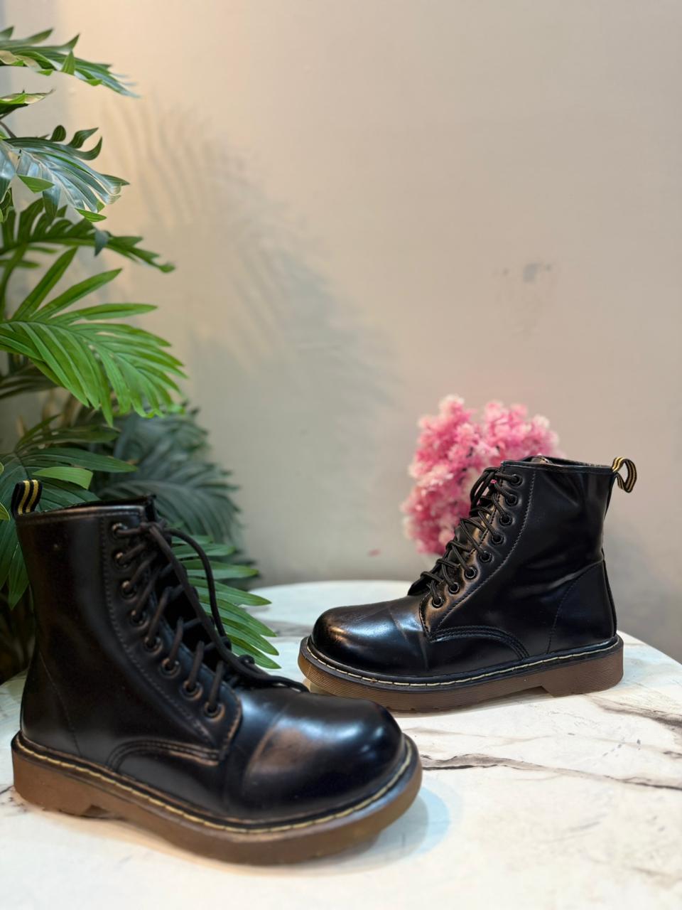 Black leather laceup ankle boot (European brand)
