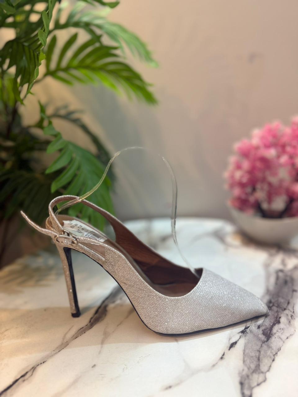 Silver sling back heel