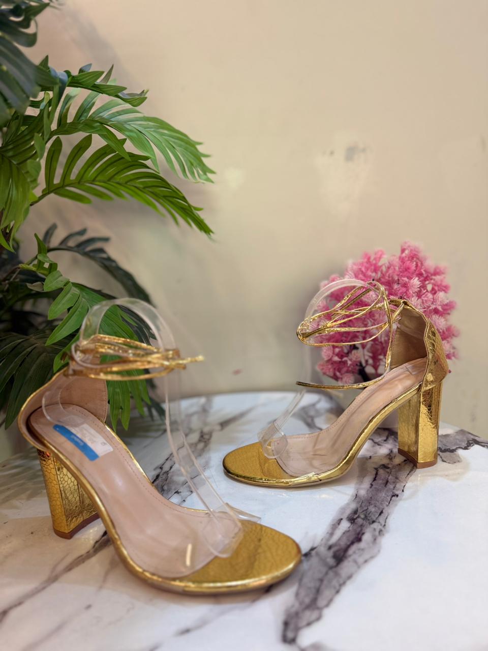 Golden strappy heel