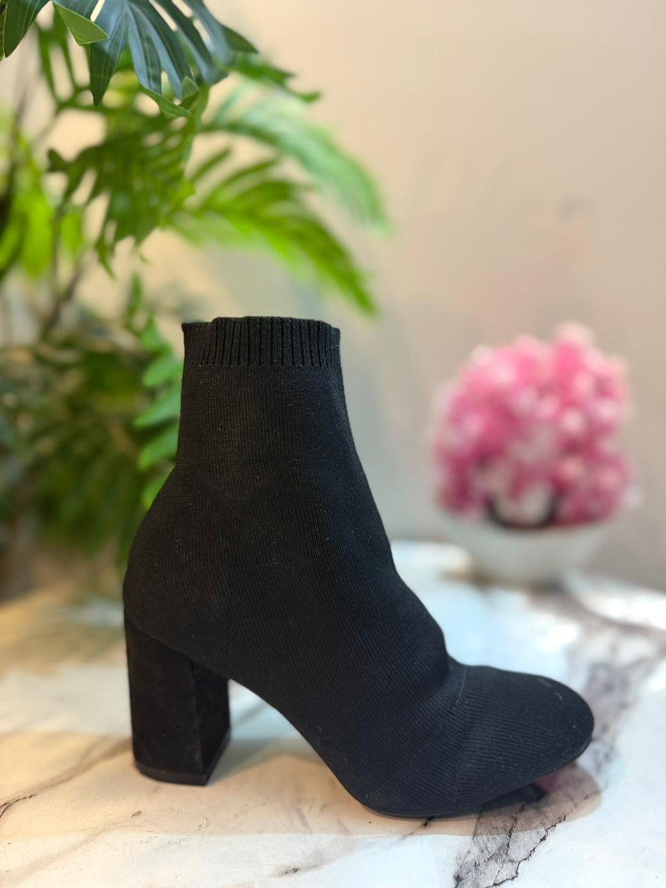 Black sock ankle boot (European brand)