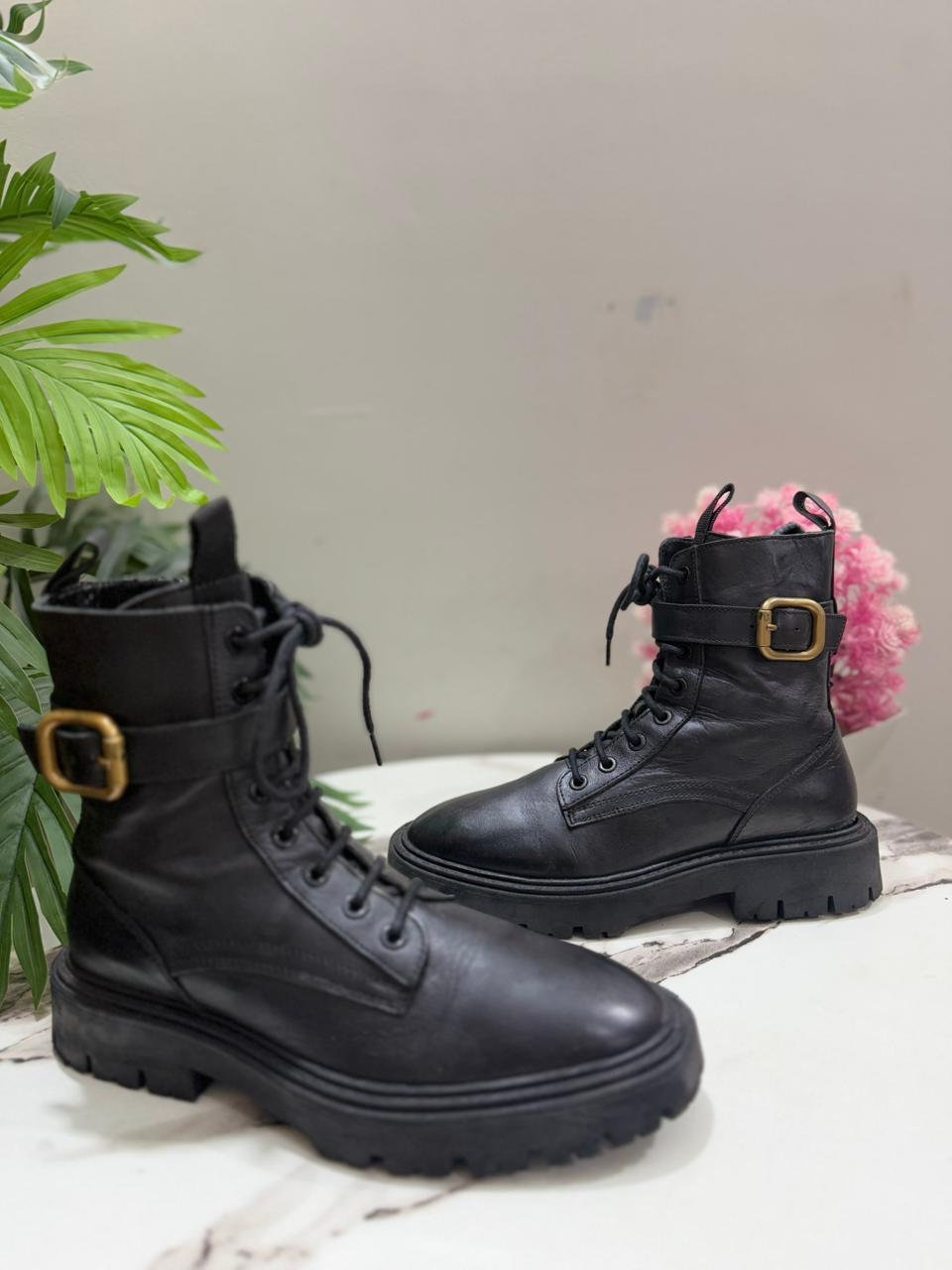 Black heeled laceup ankle boot with side zipper ( clara barson)