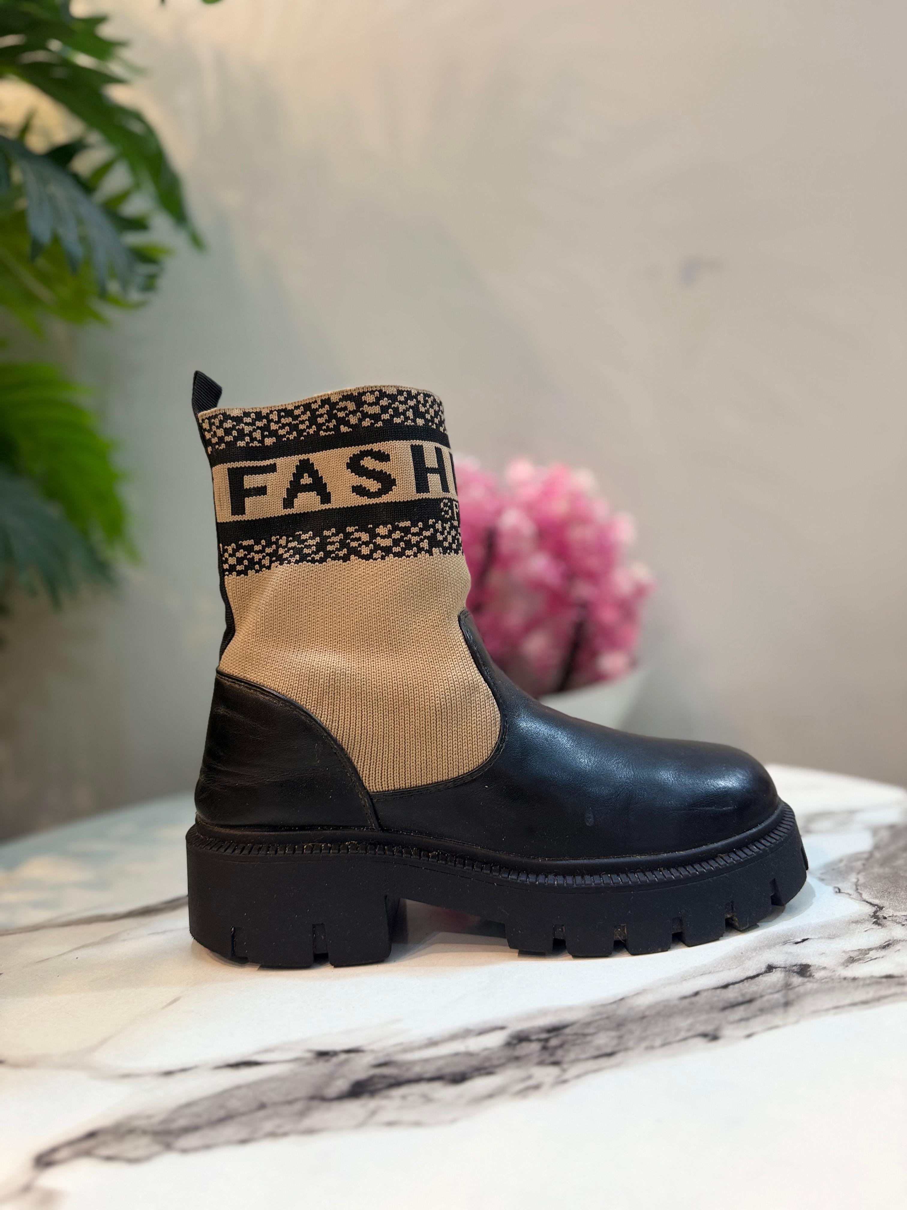 Black leather ankle boot (unknown)